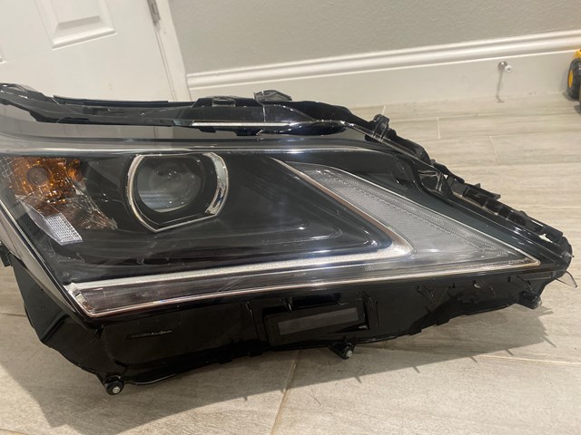 16-19 Lexus RX 350/450h Headlight passenger side.  1EJ 945 250-02