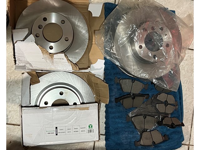2007 BMW 328i New Rotor and Brake Set (font & back)