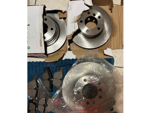 2007 BMW 328i New Rotor and Brake Set (font & back)