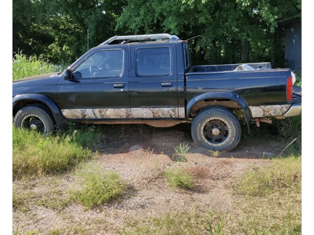 2000 Nissan Frontier Front driver Door