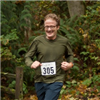 A happy trail runner at Carkeek Park
