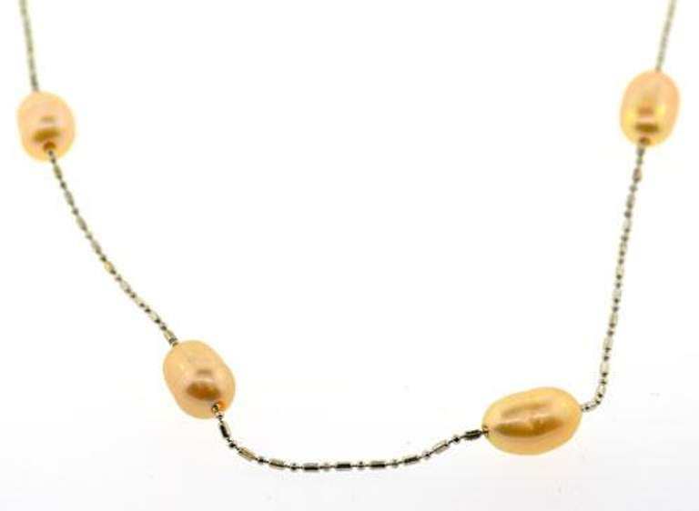 Ladies long station pearl necklace