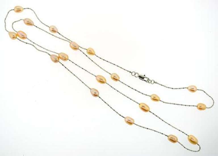 Ladies long station pearl necklace