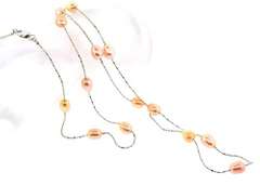 Flashy pearl station necklace