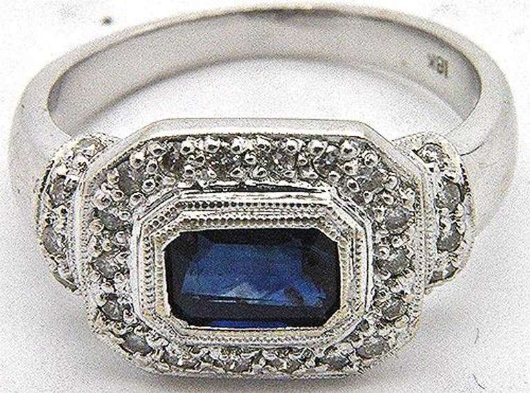 Elegant 18kt gold sapphire & diamond ring