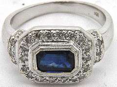 Elegant 18kt gold sapphire & diamond ring