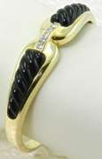 Ladies 18k onyx and diamond bangle