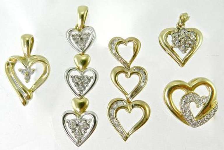 Group of 5 10k and diamond heart pendants