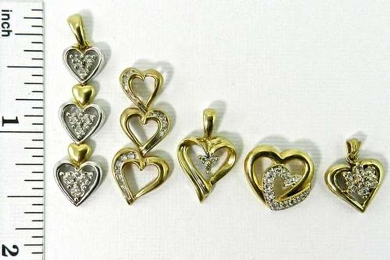 Group of 5 10k and diamond heart pendants