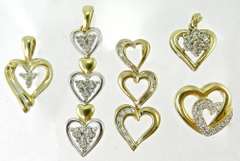 Group of 5 10k and diamond heart pendants