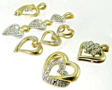 Group of 5 10k and diamond heart pendants