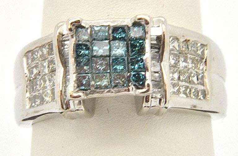 LADIES 14KT WHITE GOLD AND BLUE DIAMOND RING