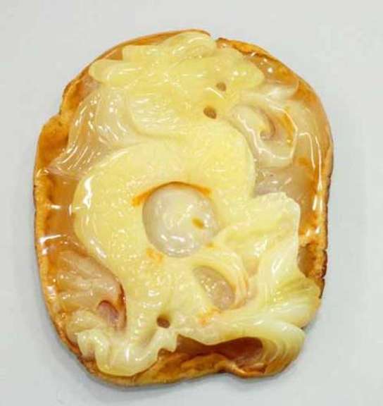Natural Amber Carved Dragon Pendant, 6.25 gm.