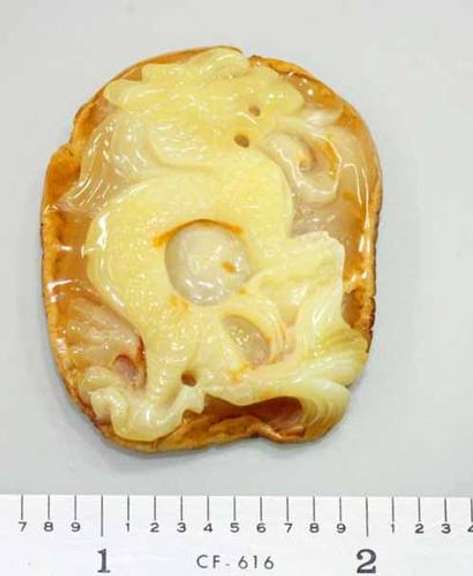 Natural Amber Carved Dragon Pendant, 6.25 gm.