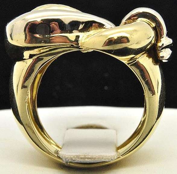 LADIES SOLID GOLD 18 KT RING.