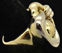 LADIES SOLID GOLD 18 KT RING.