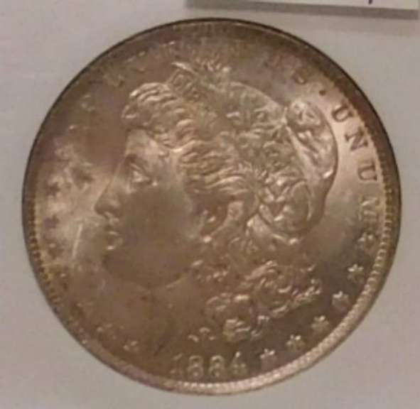 1884-O Morgan Dollar NGC full Gem MS-65, nice tone