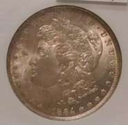 1884-O Morgan Dollar NGC full Gem MS-65, nice tone