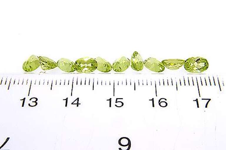 Group Lot of Oval Faceted Peridot Weighing 4.98ctw