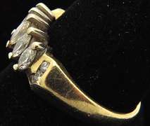 LADIES 14 KT YELLOW GOLD MARQUISE DIAMOND RING.