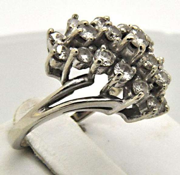 LADIES 14 KT WHITE GOLD COCKTAIL DIAMOND RING.