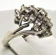 LADIES 14 KT WHITE GOLD COCKTAIL DIAMOND RING.