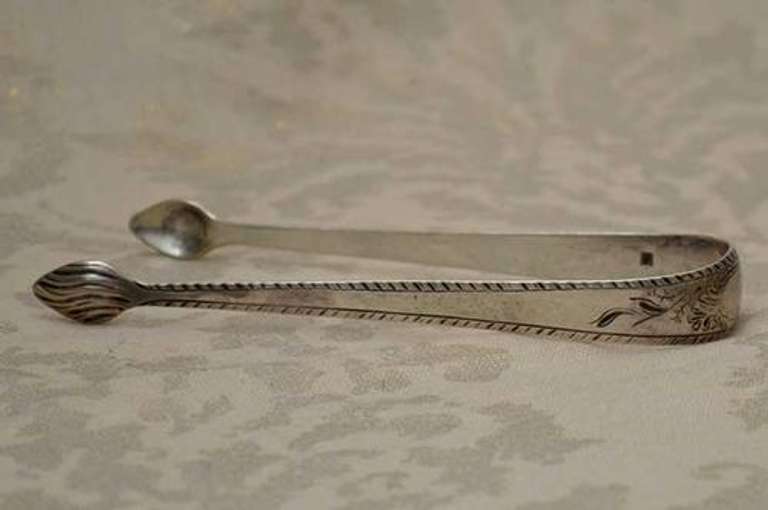 George 111 Ornate Feather Edge Sterling Sugar Tongs