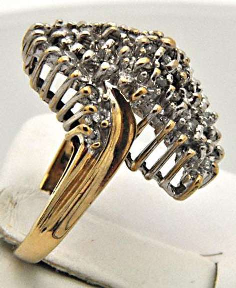 LADIES 10 KT YELLOW GOLD 1.50 CTW DIAMOND DOME RING.