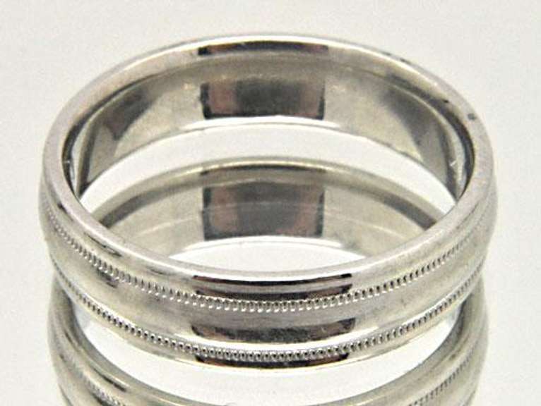 SCOTT KAY PLATINUM BAND WITN BEVELED EDGE DESIGN.