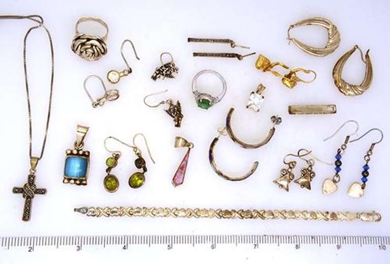 Assortment of Earrings, Pedants, Rings, Bracelet, & 16in Chain