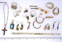 Assortment of Earrings, Pedants, Rings, Bracelet, & 16in Chain