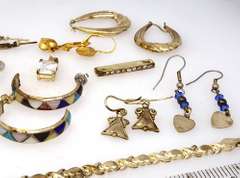 Assortment of Earrings, Pedants, Rings, Bracelet, & 16in Chain