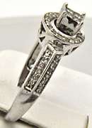 LADIES 14 KT WHITE GOLD DIAMOND RING.