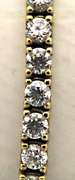 LADIES 14 KT YELLOW GOLD TENNIS BRACELET.