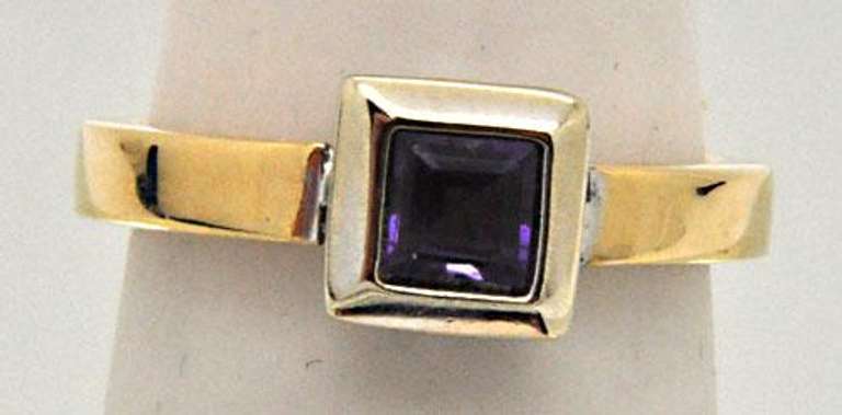 LADIES 18 KT YELLOW AND WHITE GOLD AMETHYST SET.