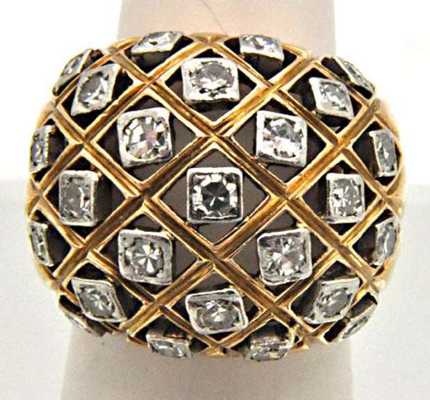 LADIES 18 KT YELLOW GOLD DIAMOND DOME RING.