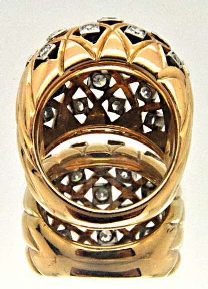 LADIES 18 KT YELLOW GOLD DIAMOND DOME RING.