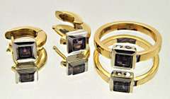 LADIES 18 KT YELLOW AND WHITE GOLD AMETHYST SET.