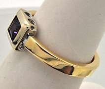 LADIES 18 KT YELLOW AND WHITE GOLD AMETHYST SET.