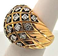 LADIES 18 KT YELLOW GOLD DIAMOND DOME RING.