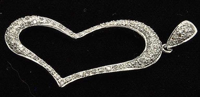 HEART PENDANT WITH DIAMONDS.