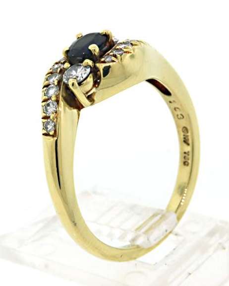Graceful Blue Sapphire & Diamond Bypass Ring