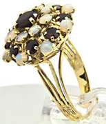 LADIES 18 KT YELLOW GOLD GARNET AND OPAL PYRAMID RING.