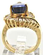 LADIES 14KT YELLOW GOLD TANZANITE DIAMOND RING.