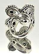 LADIES ELEGANZA RING AND MATCHING EARRINGS.