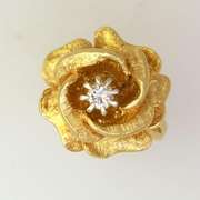 Beautiful Gold Flower Ring w/ .25CT Center Diamond