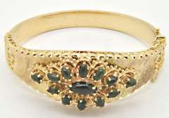 LADIES 14 KT YELLOW GOLD BANGLE BRACELET.