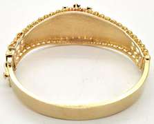 LADIES 14 KT YELLOW GOLD BANGLE BRACELET.
