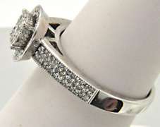 LADIES 14 KT WHITE GOLD DIAMOND RING.