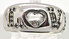 LADIES 18 KT WHITE GOLD DIAMOND 'LOVE' RING.